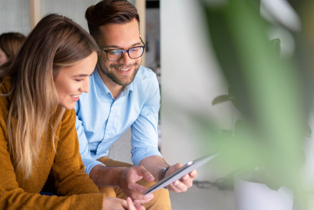 Couple reviewing their finances together on a tablet